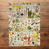 Gibsons RHS Botanical Bliss | 1000 Piece Jigsaw Puzzle made up on wooden table