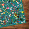 Gibsons RHS Floral Fantasy 1000 Piece Jigsaw Puzzle cropped on wooden table